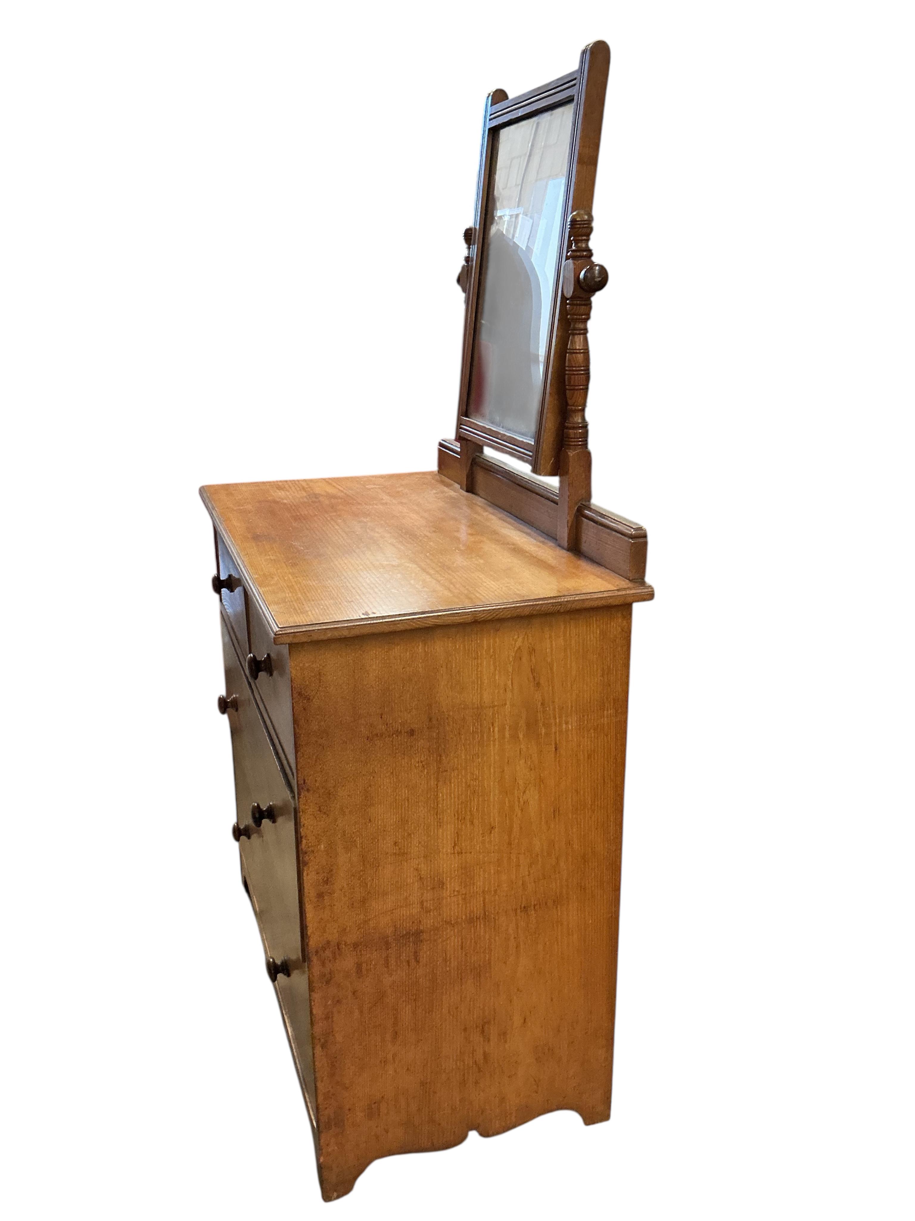 A late Victorian ash dressing chest of drawers by Gillows, width 95cm, depth 52cm, height 162cm